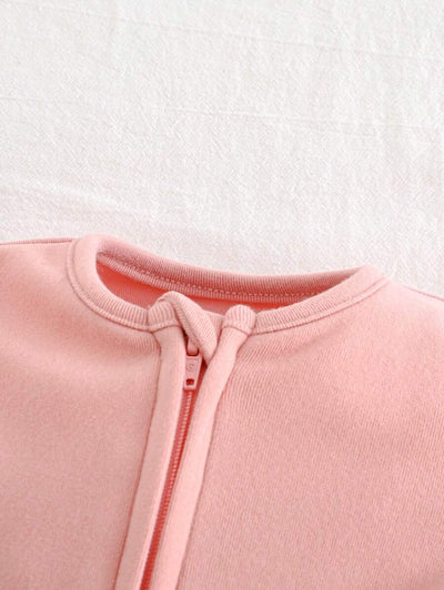 Kit com 2 macacões de manga longa para bebê · Rosa e creme 