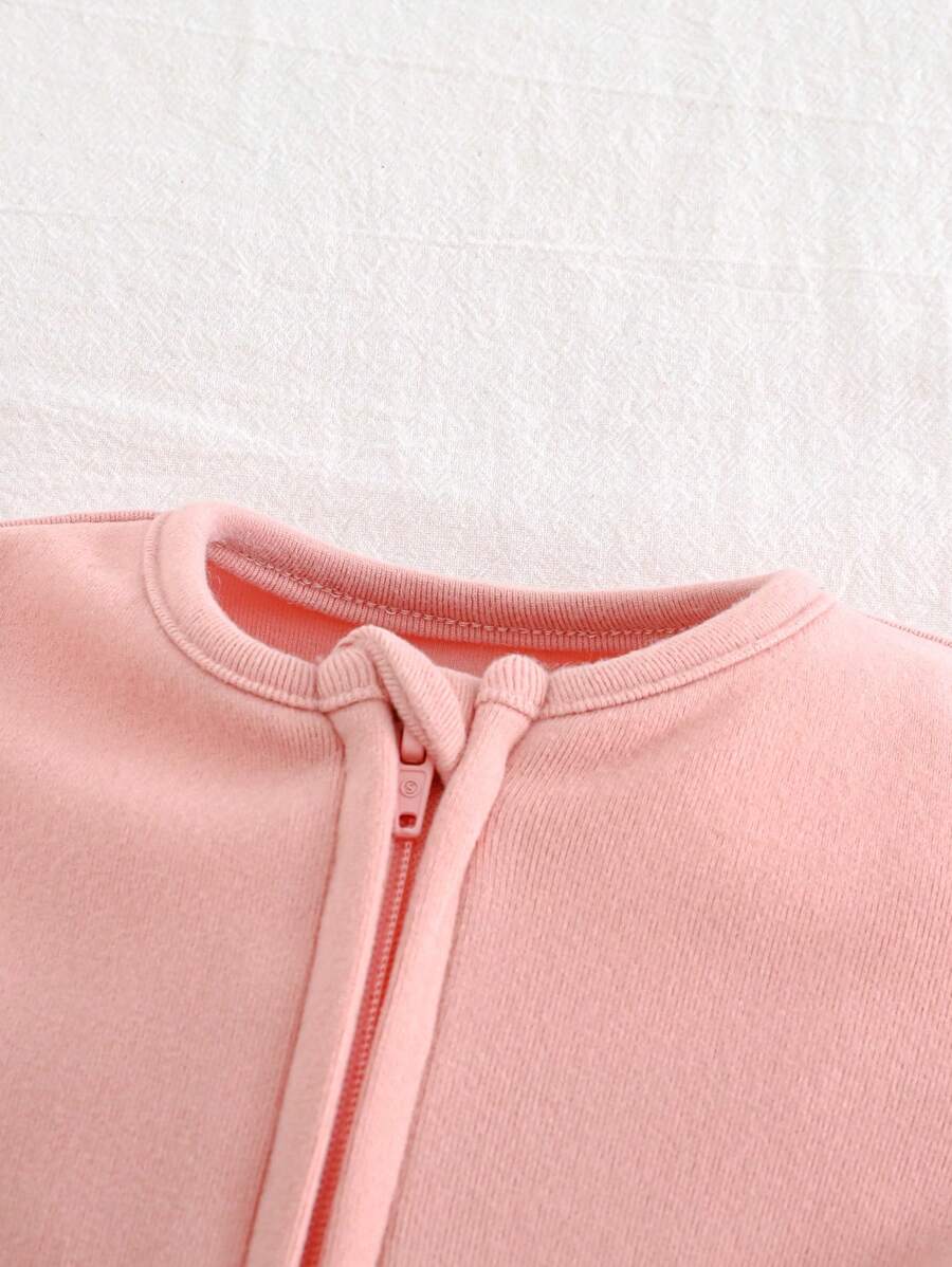 Kit com 2 macacões de manga longa para bebê · Rosa e creme 