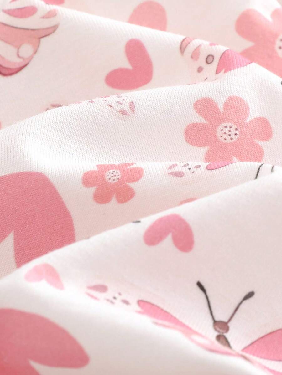 Conjunto vestido estampado e casaquinho · Borboletas rosa 