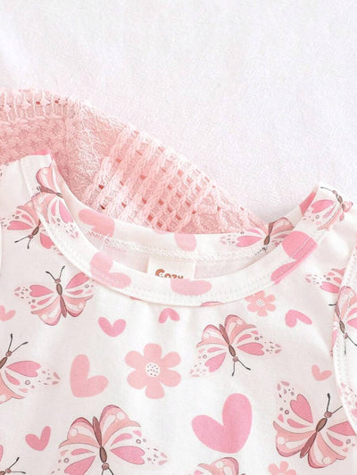 Conjunto vestido estampado e casaquinho · Borboletas rosa 