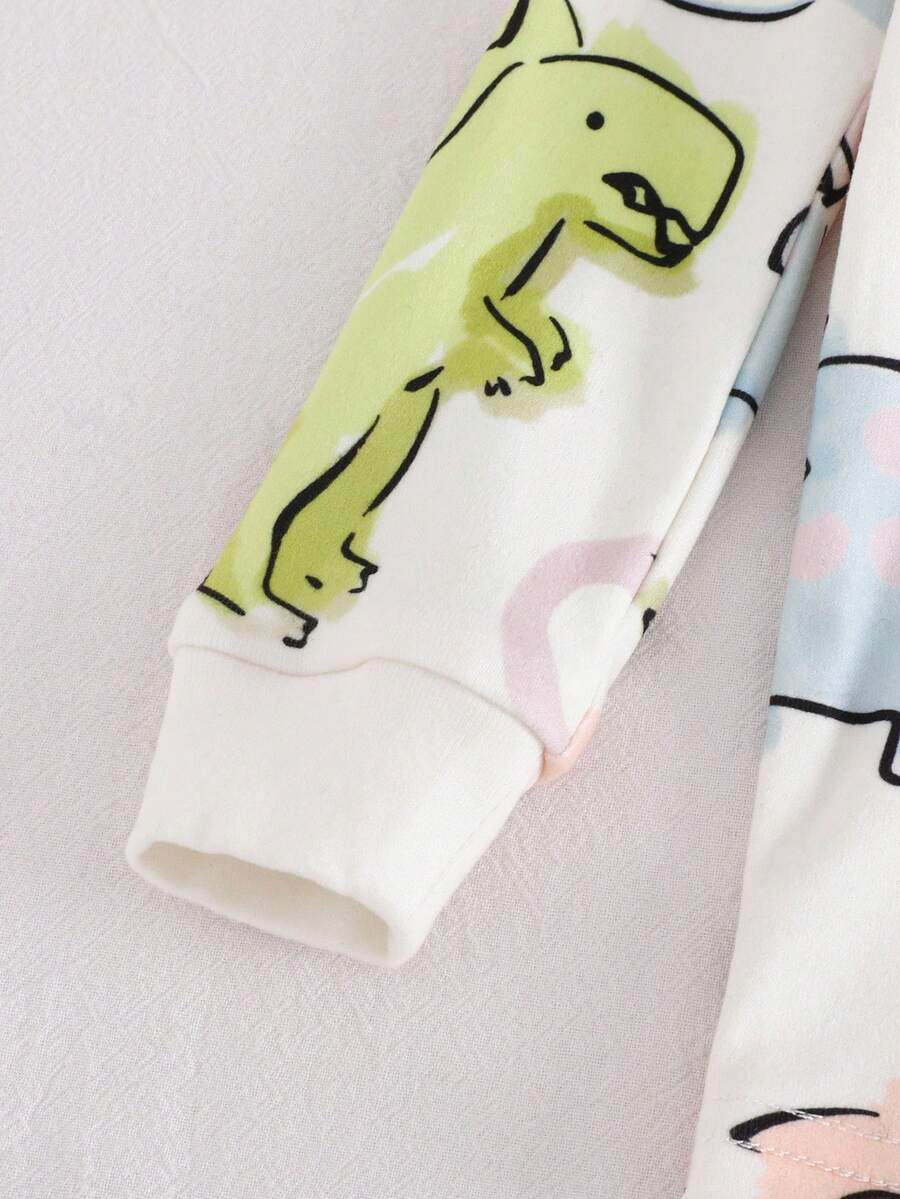 Pijama de Bebê 2 Peças · Bichinhos com punhos brancos 