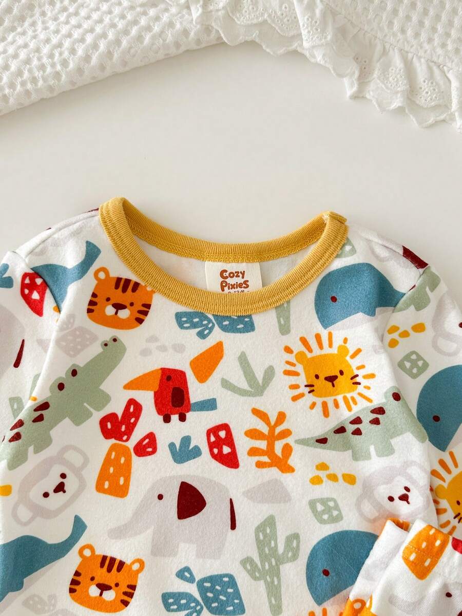 Pijama de Bebê 2 Peças · Bichinhos e punhos amarelos 
