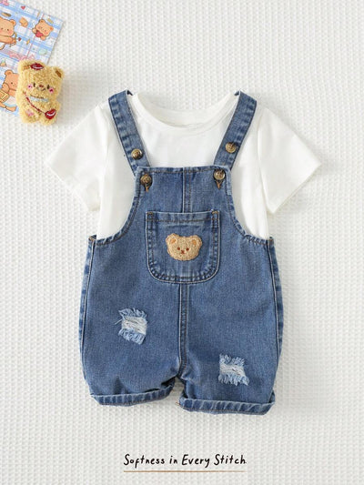 Jardineira Jeans Ursinho para Bebê · Jeans escuro com rasgos 