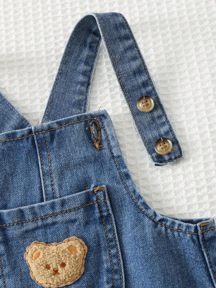 Jardineira Jeans Ursinho para Bebê · Jeans escuro com rasgos 