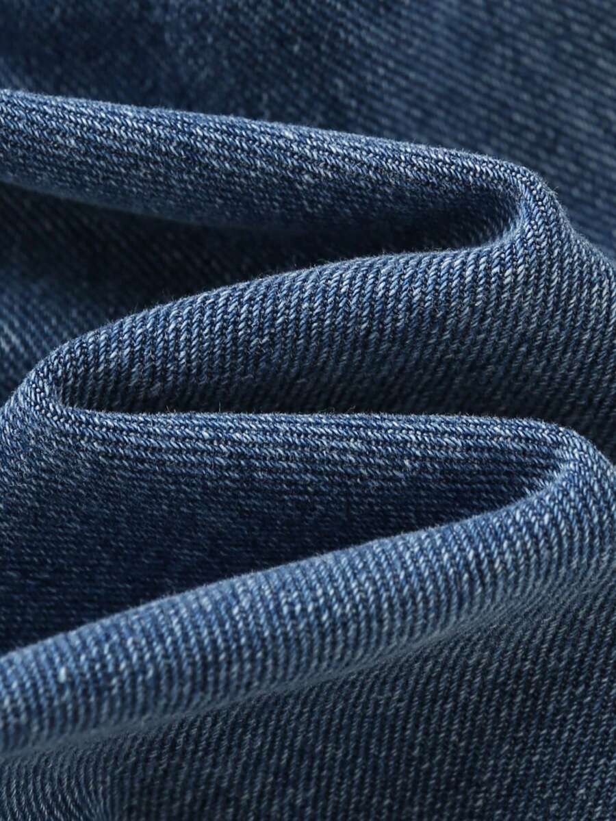 Jardineira Jeans Ursinho para Bebê · Jeans escuro com rasgos 