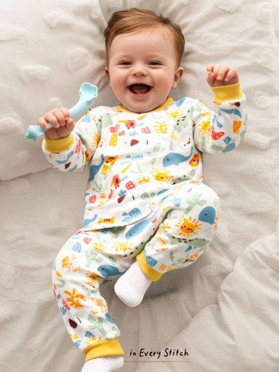 Pijama de Bebê 2 Peças · Bichinhos e punhos amarelos 