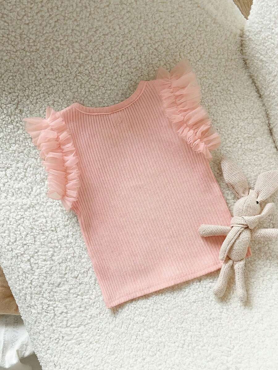 Camiseta Canelada com Babados para Bebê · Rosa chiclete #modelo_rosa-chiclete