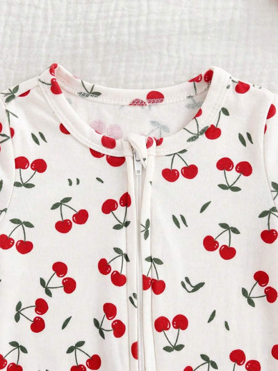 Macacão com pezinhos e zíper para bebê · Cerejas branco 