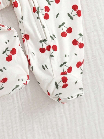 Macacão com pezinhos e zíper para bebê · Cerejas branco 