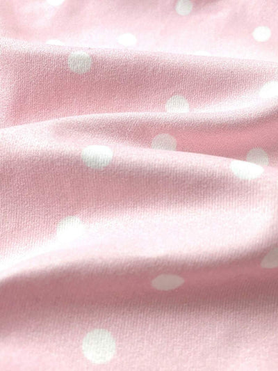 Macacão com pezinhos e zíper para bebê · Poá rosa 