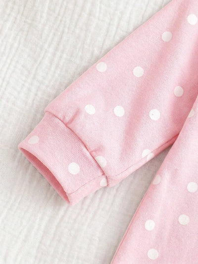 Macacão com pezinhos e zíper para bebê · Poá rosa 