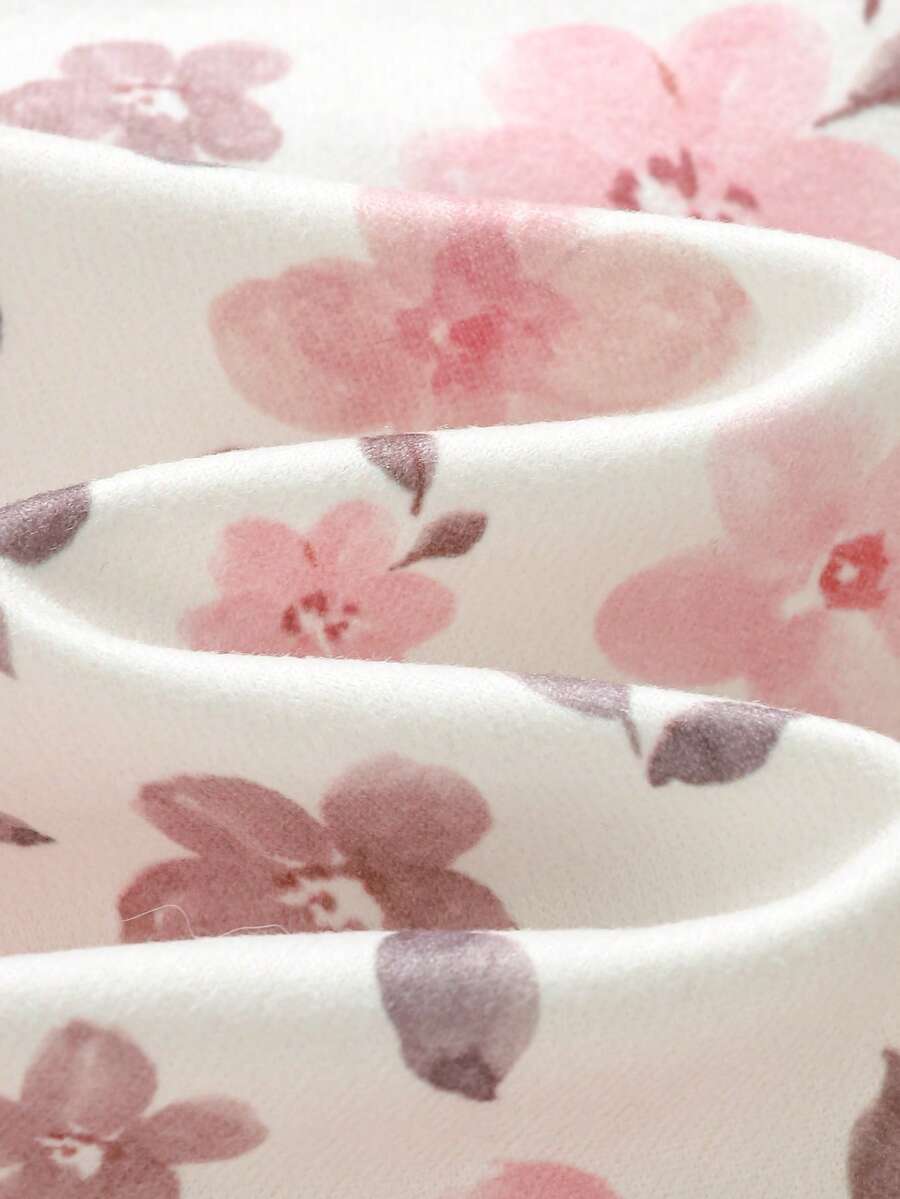 Pijama Macacão Estampado com Zíper · Floral rosa 