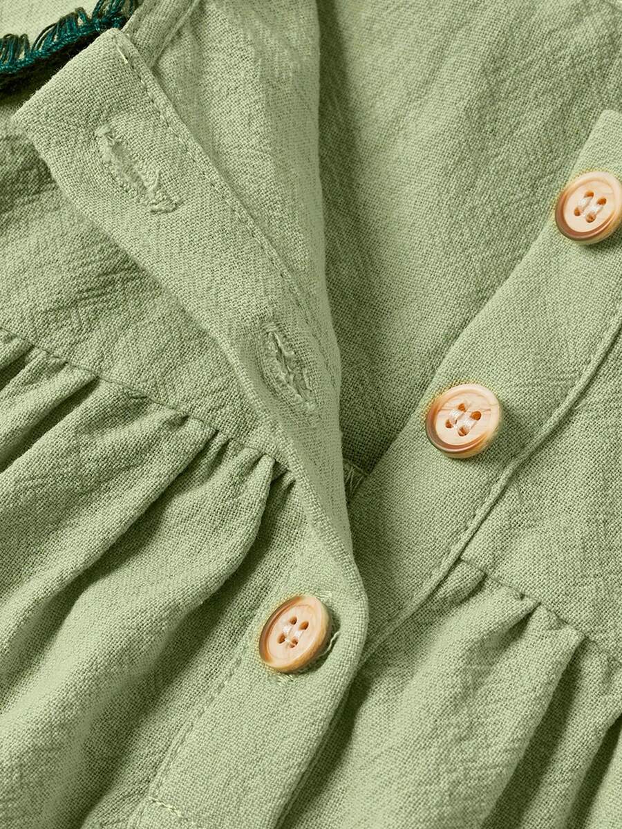 Vestido para bebê com gola bordada · Floral verde 