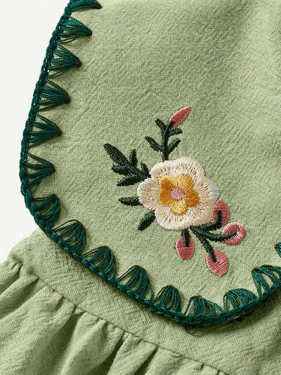 Vestido para bebê com gola bordada · Floral verde 