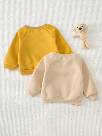 Kit com 2 Moletons para Bebê Bichinhos · Leão amarelo e urso bege 