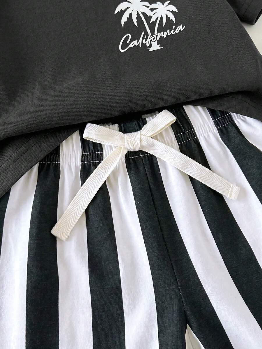 Conjunto com camiseta de palmeiras e shorts listrado · Preto e branco 