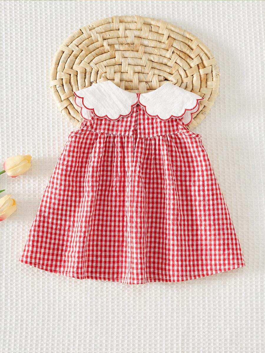Vestido para bebê com gola bordada · Xadrez vermelho 