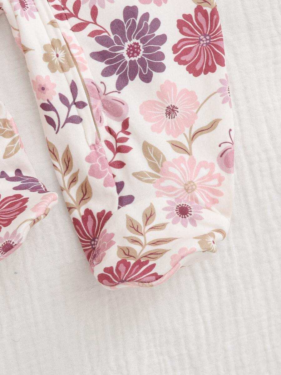 Macacão com pezinhos e zíper para bebê · Floral lilás 