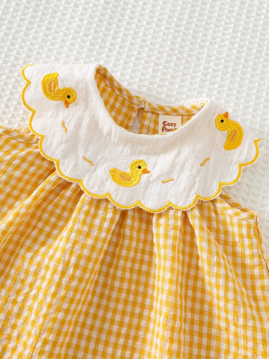 Vestido para bebê com gola bordada · Patinhos amarelo 
