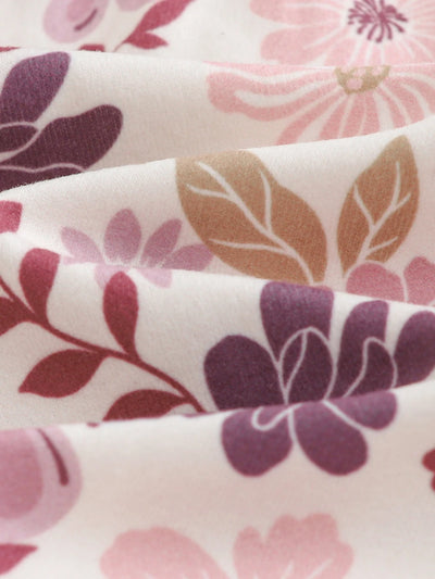 Macacão com pezinhos e zíper para bebê · Floral lilás 