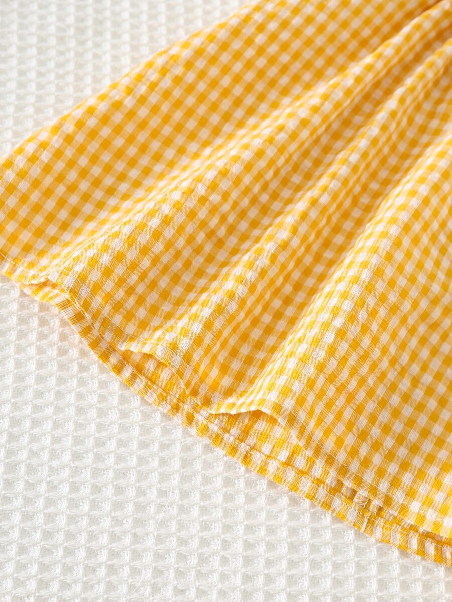 Vestido para bebê com gola bordada · Patinhos amarelo 