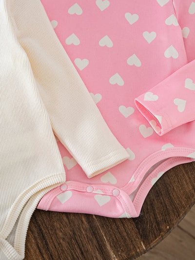 Kit com 2 Bodies de Manga Longa para Bebê · Corações creme e rosa 