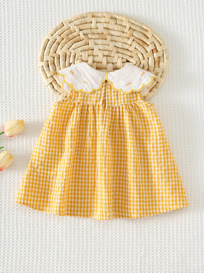 Vestido para bebê com gola bordada · Patinhos amarelo 