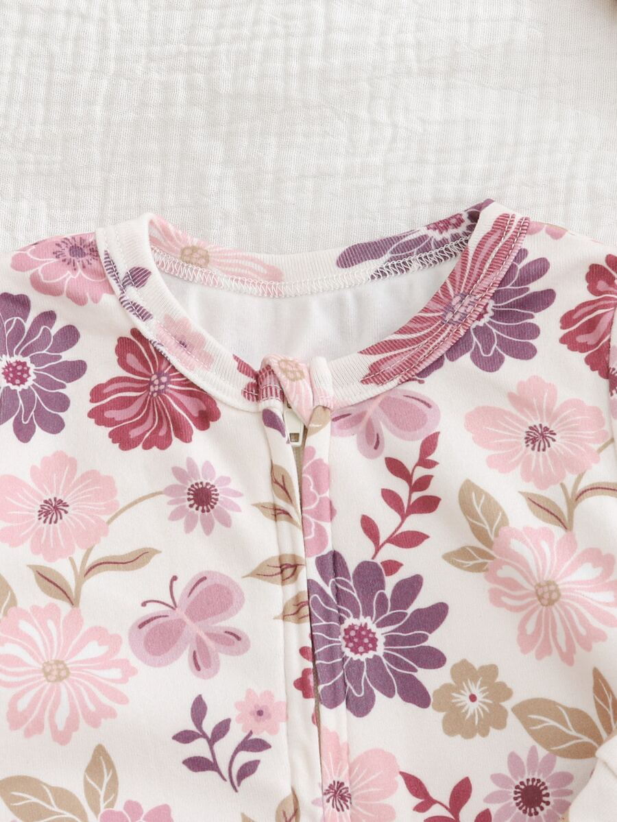 Macacão com pezinhos e zíper para bebê · Floral lilás 