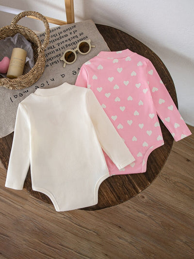 Kit com 2 Bodies de Manga Longa para Bebê · Corações creme e rosa 
